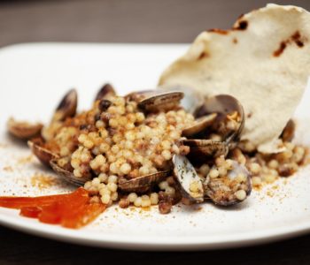 Fregola sarda alle arselle e bottarga di muggine